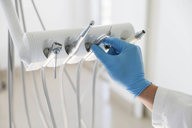 Professional Emergency Dentist technician working in Gilman, IL